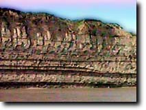 Large chuncks of rock from the cliff would fall into the river below every few seconds