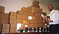 Paul Taylor with packaged video libraries for prisons (Photo copyrighted, Films for Christ)