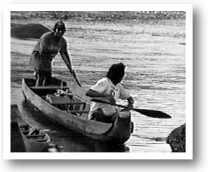 Two Men in a Canoe. Photo copyright by AAJ.