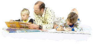 Children and dad reading bedtime stories. Photo copyrighted.