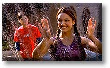 Jesse Bradford and Paula Garces in “Clockstoppers”