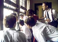 Kevin Kline as Mr. Hundert who, along with his students, watch for the Headmaster’s reaction to the broken window incident