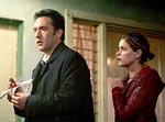 John Cusack and Amanda Peet in “Identity,” courtesy of Columbia Pictures