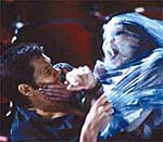 Scene from Stir of Echoes with Kevin Bacon.
