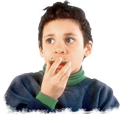 Boy eating cookie. Photo copyrighted