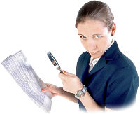 Woman with magnifying glass analyzing newspaper. Photo copyrighted.