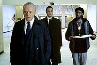 Anthony Hopkins, Gabriel Macht and Chris Rock in “Bad Company”